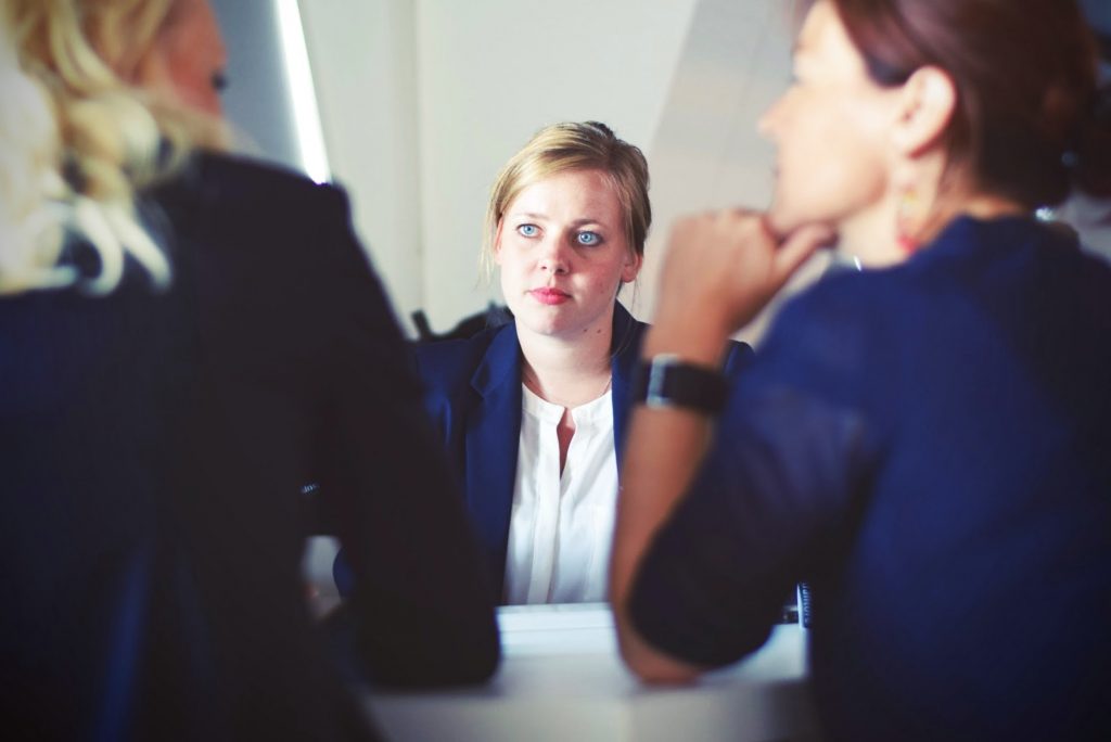 A person interviewing people.